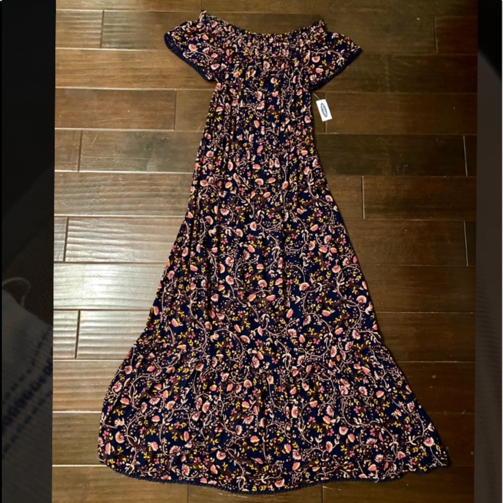 Off shoulder dress.